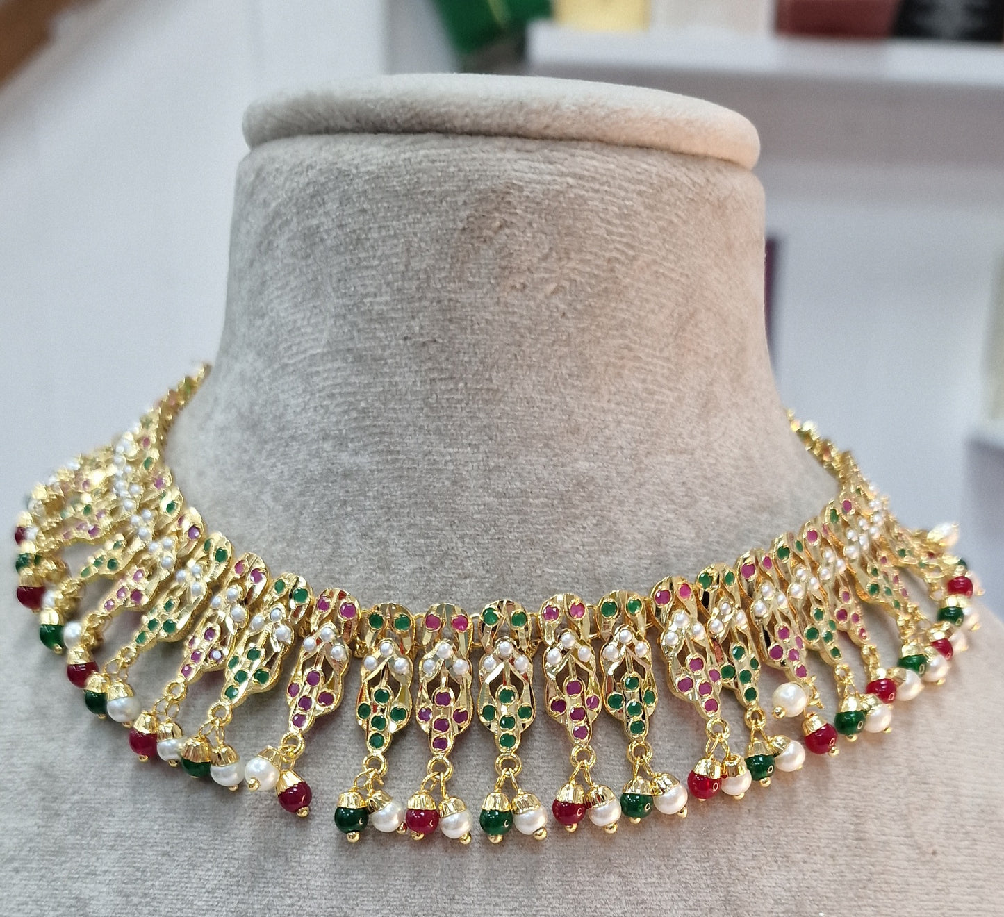 A heavy look, lightweight, Indian, gold plated and jarau multicoloured set