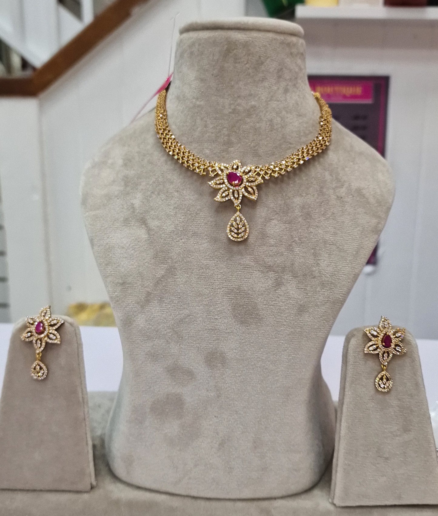 INDIAN STYLISH, GOLD PLATED JEWELLERY, STUDDED WITH FANCY STONES NECKLACE N EARRINGS