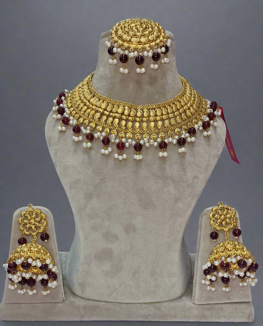 Indian gold plated ,light weight, Party Wear jewellery Set with matching Earrings and Tikka
