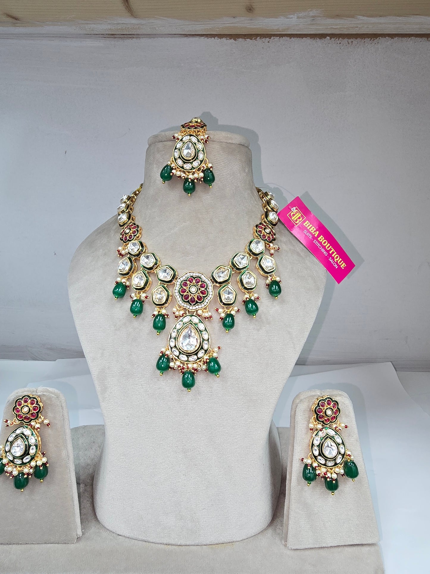Beautiful designer kundan necklace sets with earrings and tikka in 2 colours