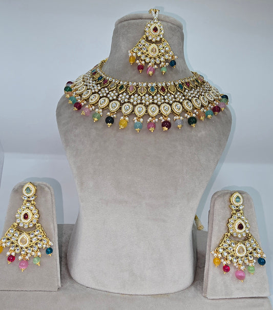 Asian multicoloured kundan set with earrings and tikka