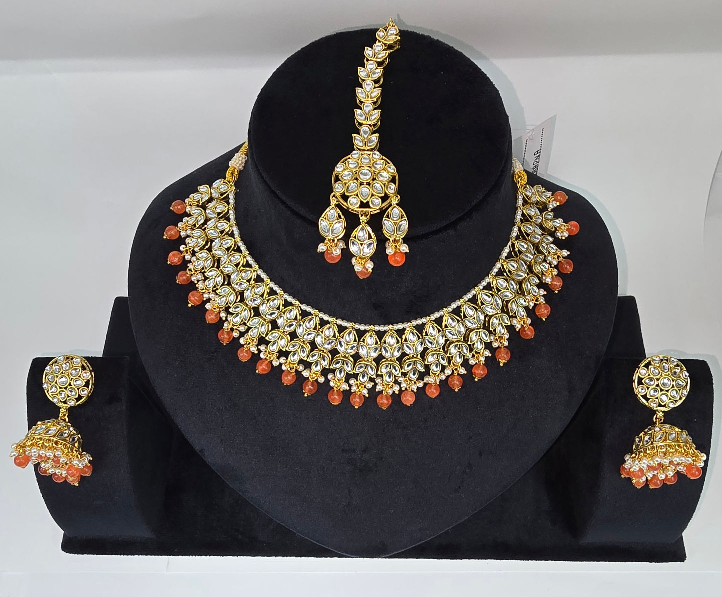 Kundan sets with jhumkas and tikka