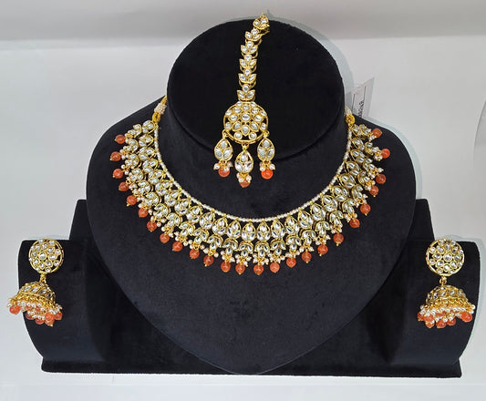 Kundan sets with jhumkas and tikka