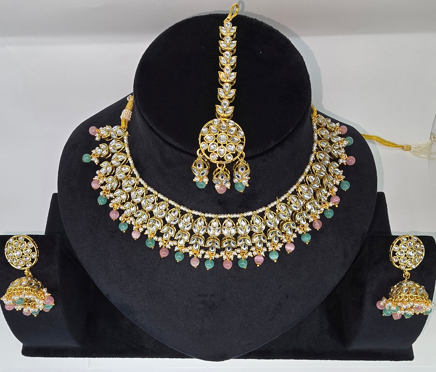 Kundan sets with jhumkas and tikka