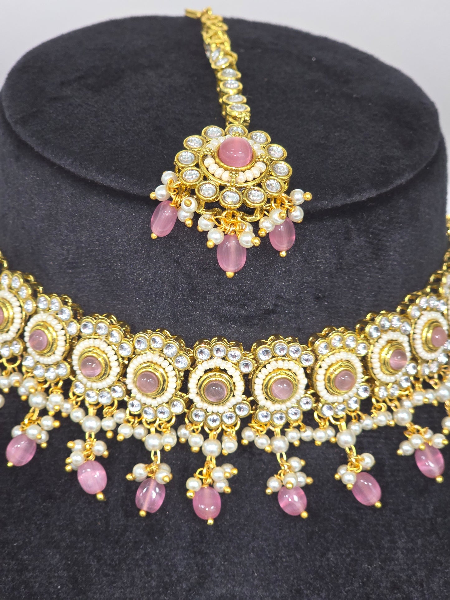 Choker set with jhumkas and tikka in light pink