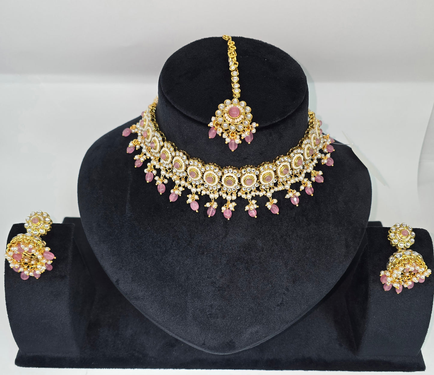 Choker set with jhumkas and tikka in light pink