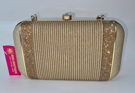 Clutch bag Designer in Golden