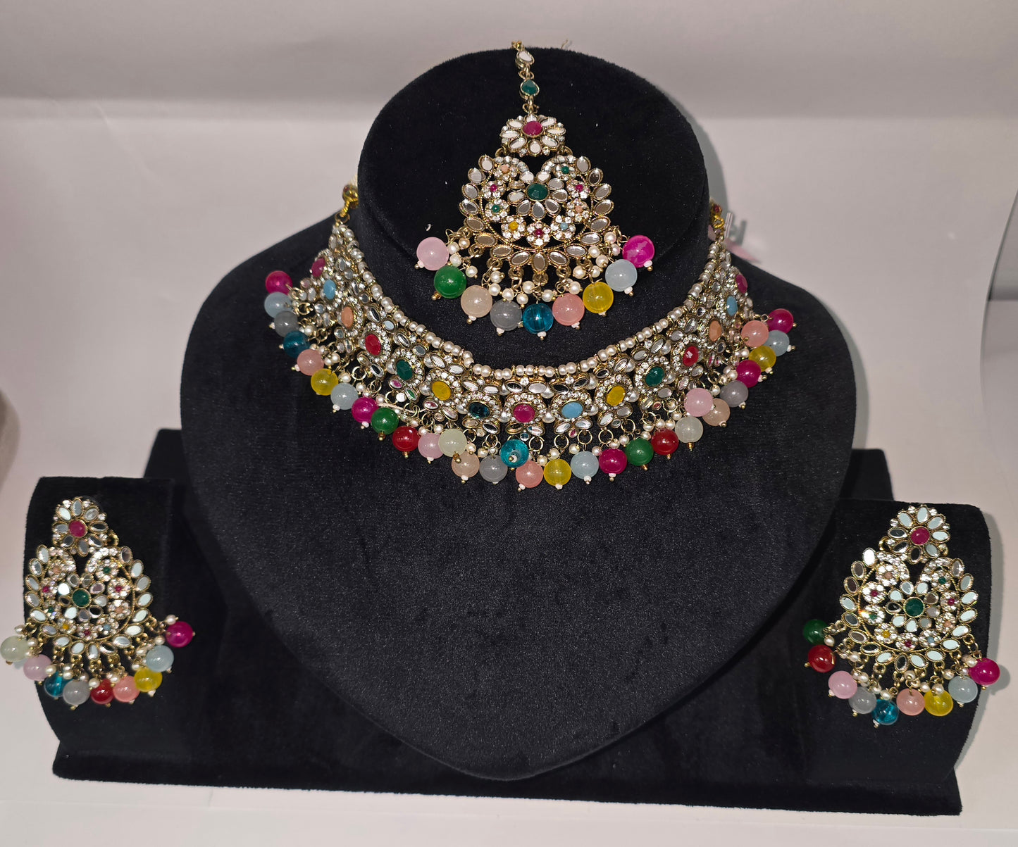 Beautiful Partywear sets with matching Earrings and Tikka in 2 colours
