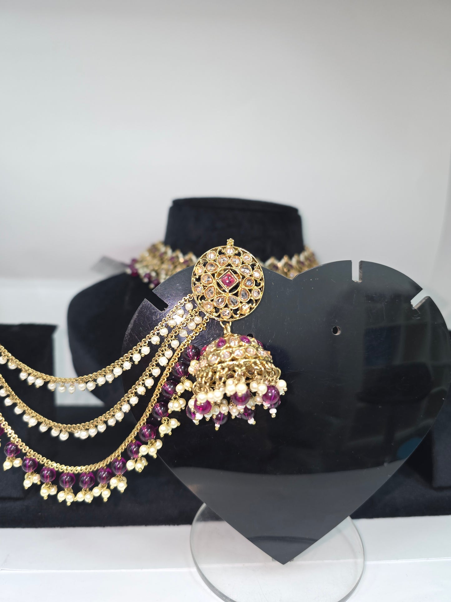 Party wear Polki set with Jhumkas, Tikka and Sahare in Cherry colour