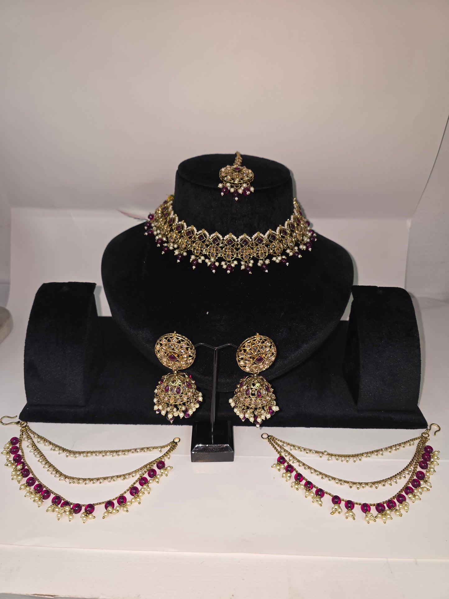Party wear Polki set with Jhumkas, Tikka and Sahare in Cherry colour