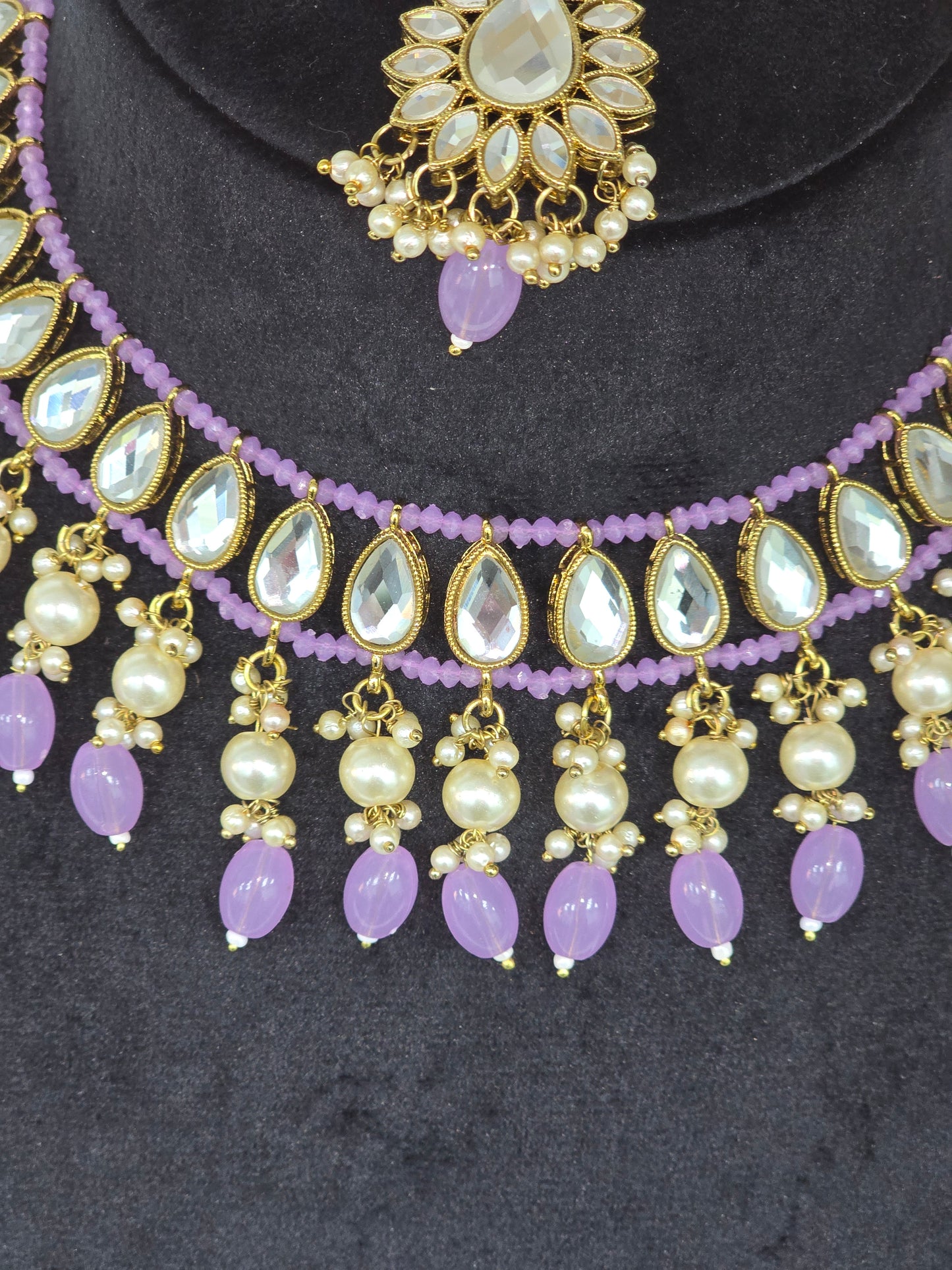 Kundan studded set with Earrings and Tikka in Lavender colour
