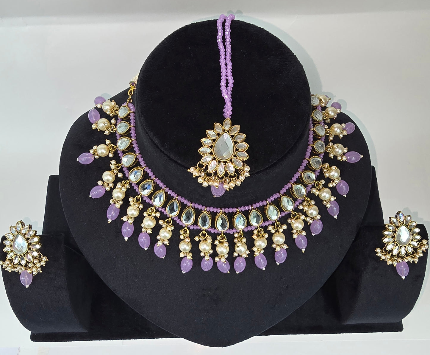 Kundan studded set with Earrings and Tikka in Lavender colour