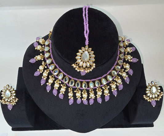 Kundan studded set with Earrings and Tikka in Lavender colour