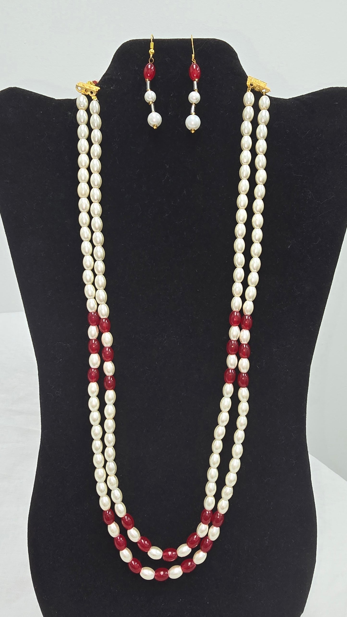 Double strand pearl necklace with hanging earrings
