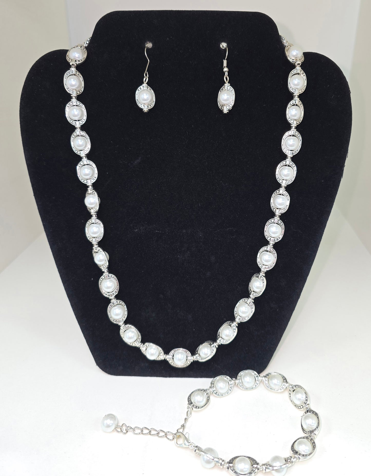 Designer pearl 4 piece set in silver colour