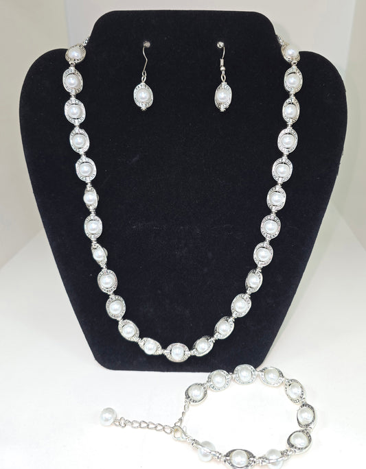 Designer pearl 4 piece set in silver colour