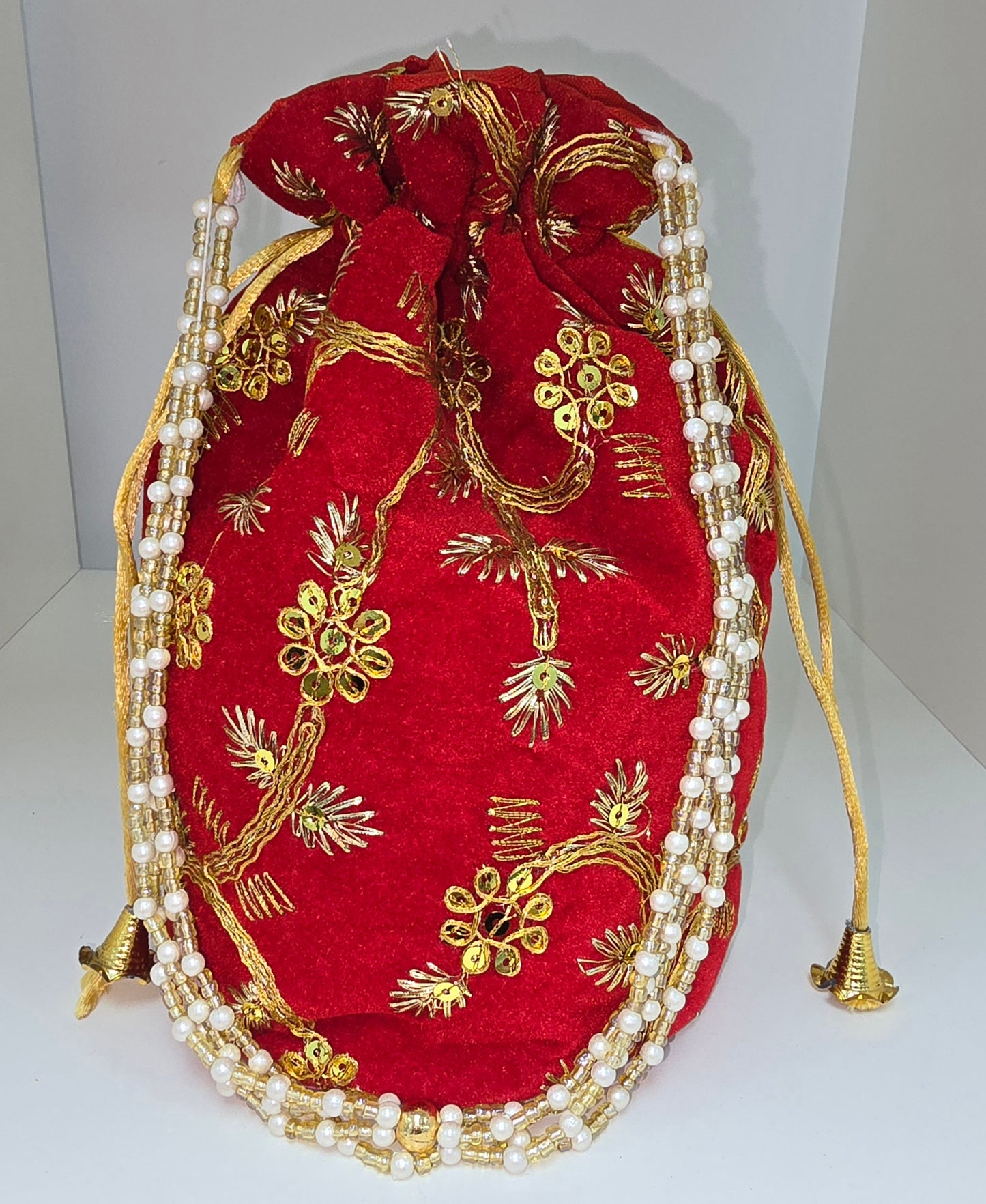 Velvet red potli