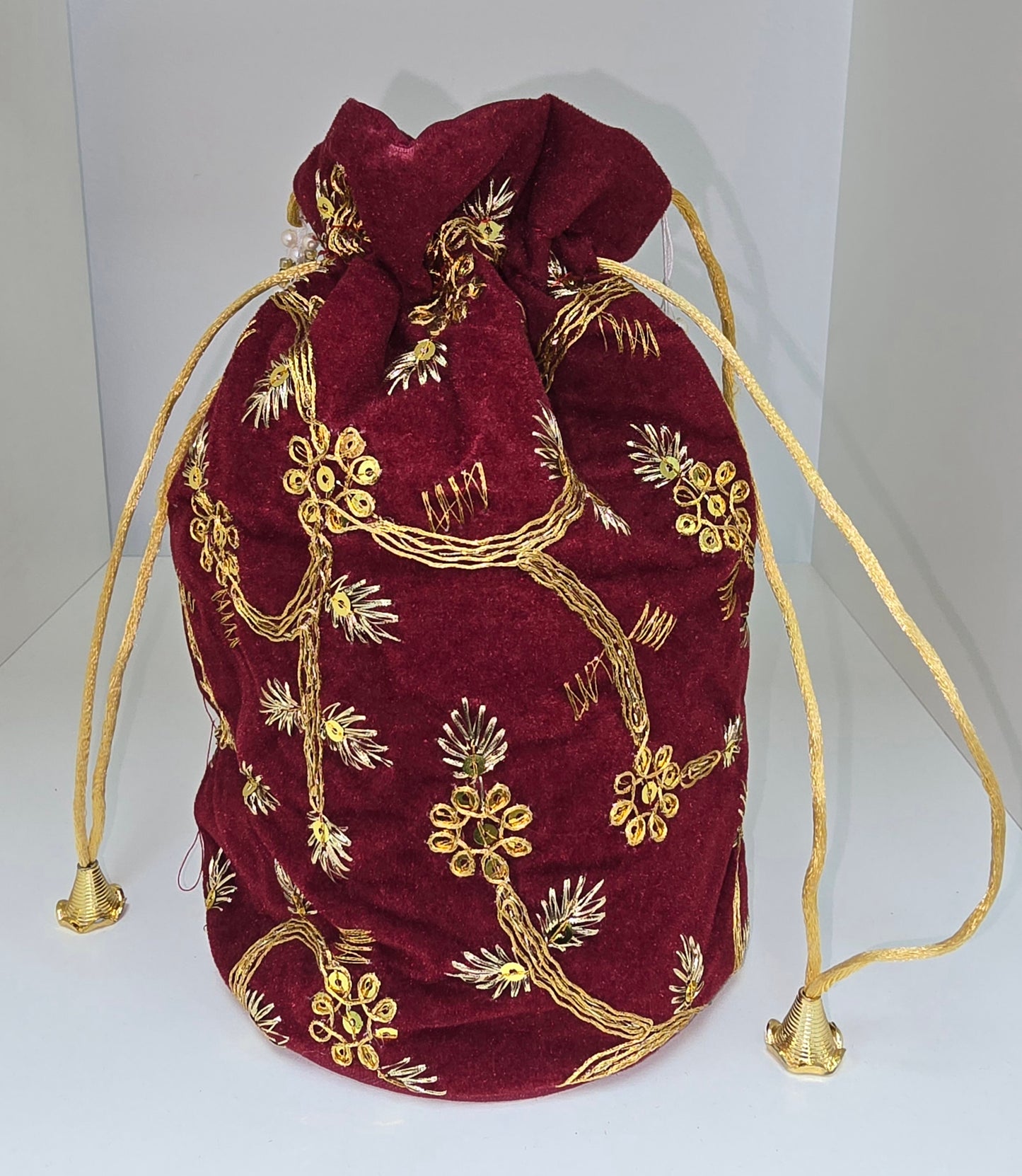 Dark red velvet potli