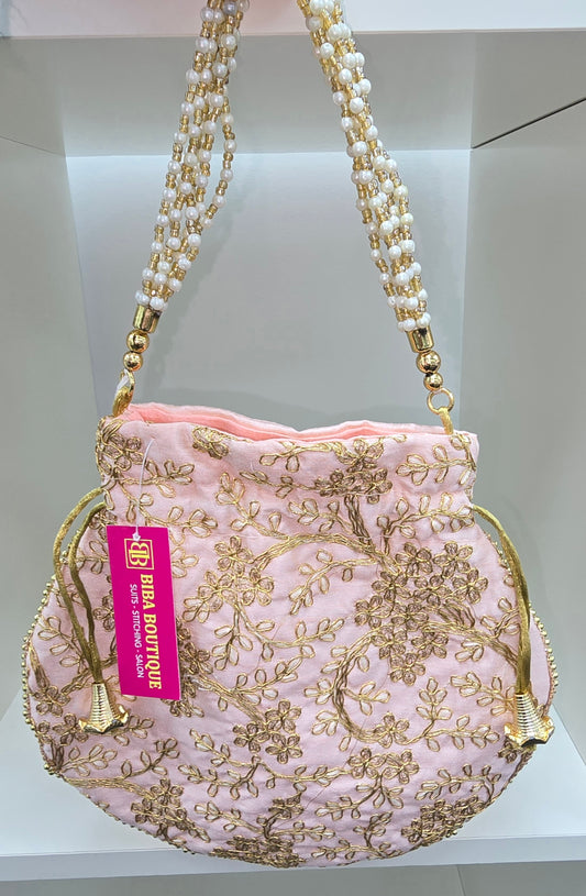 Fancy light pink colour  potli