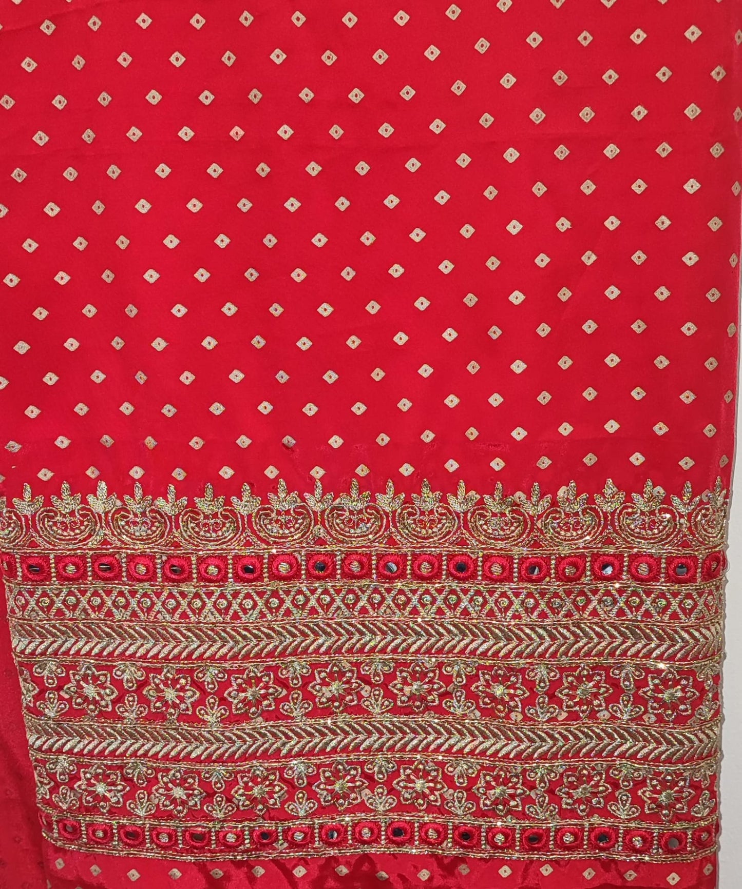Unstitched dress material in blood red colour
