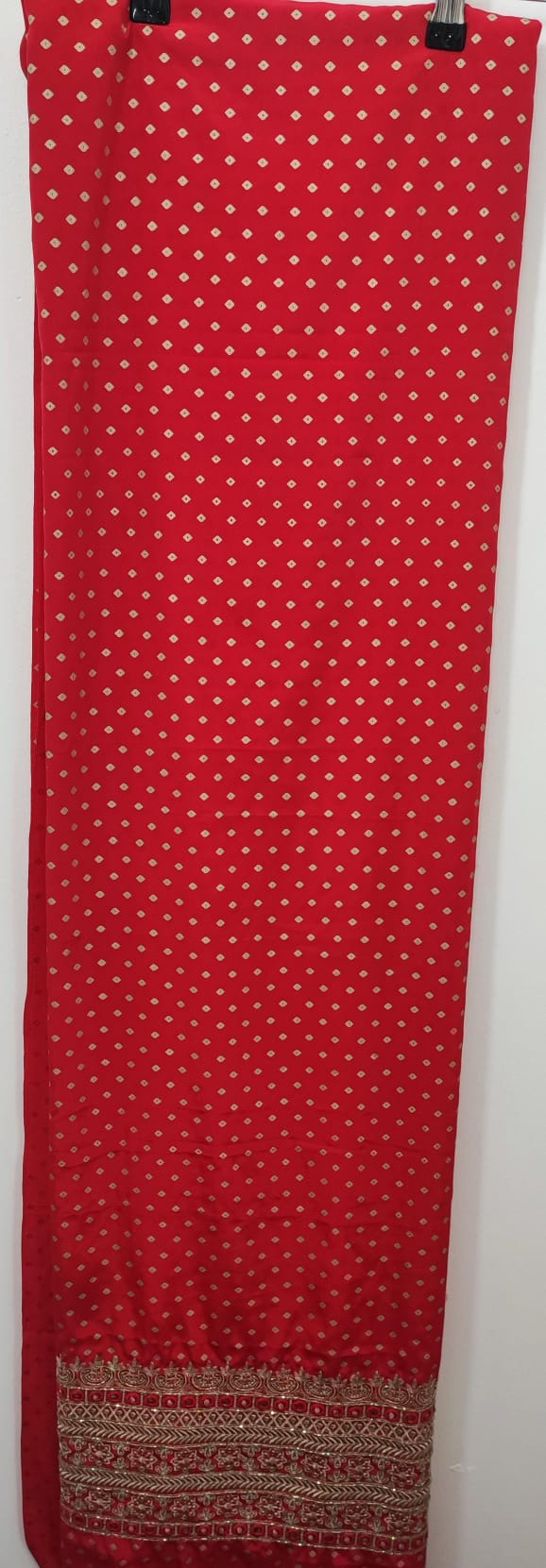 Unstitched dress material in blood red colour