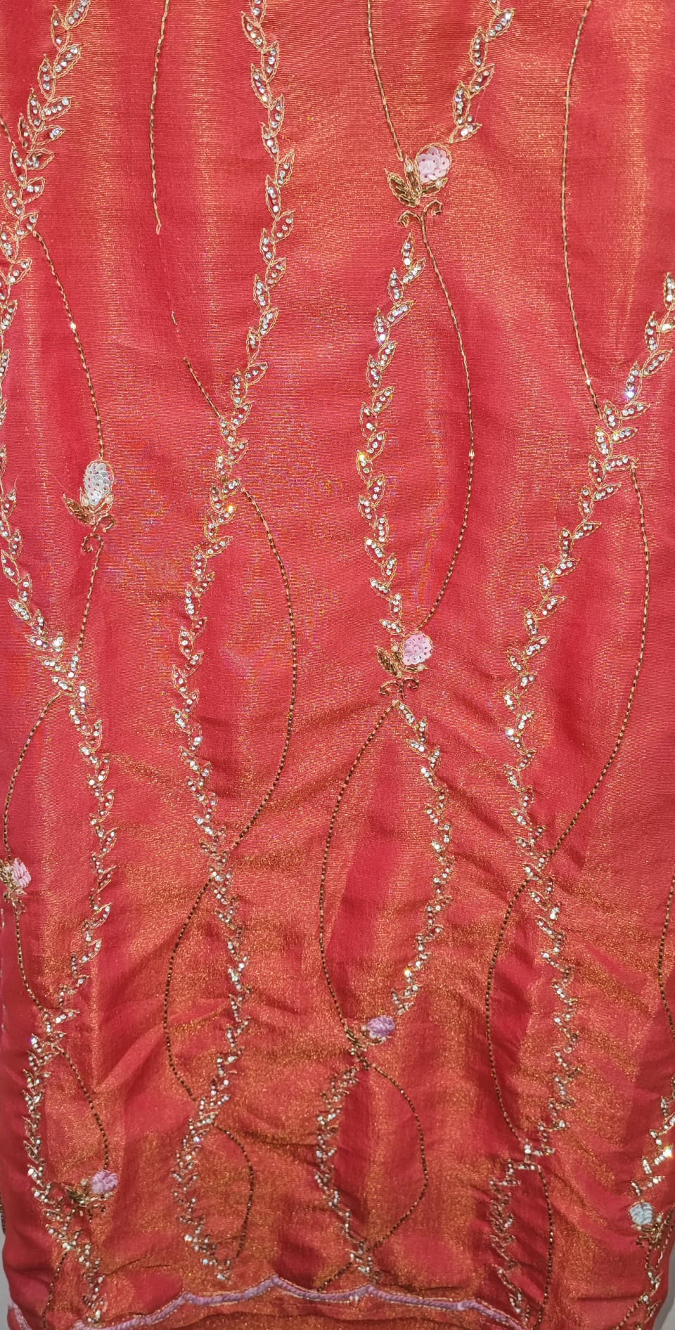 Unstitched dress material in peach colour