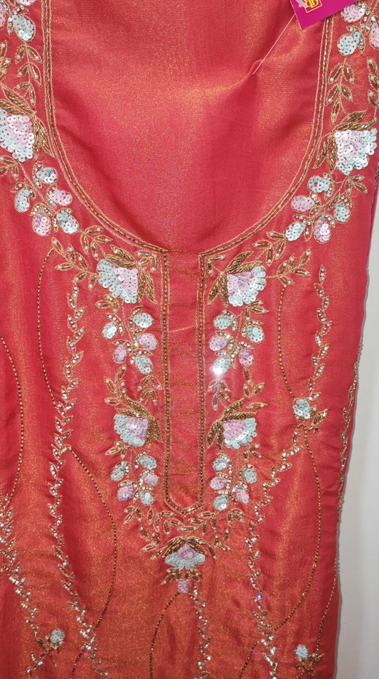 Unstitched dress material in peach colour