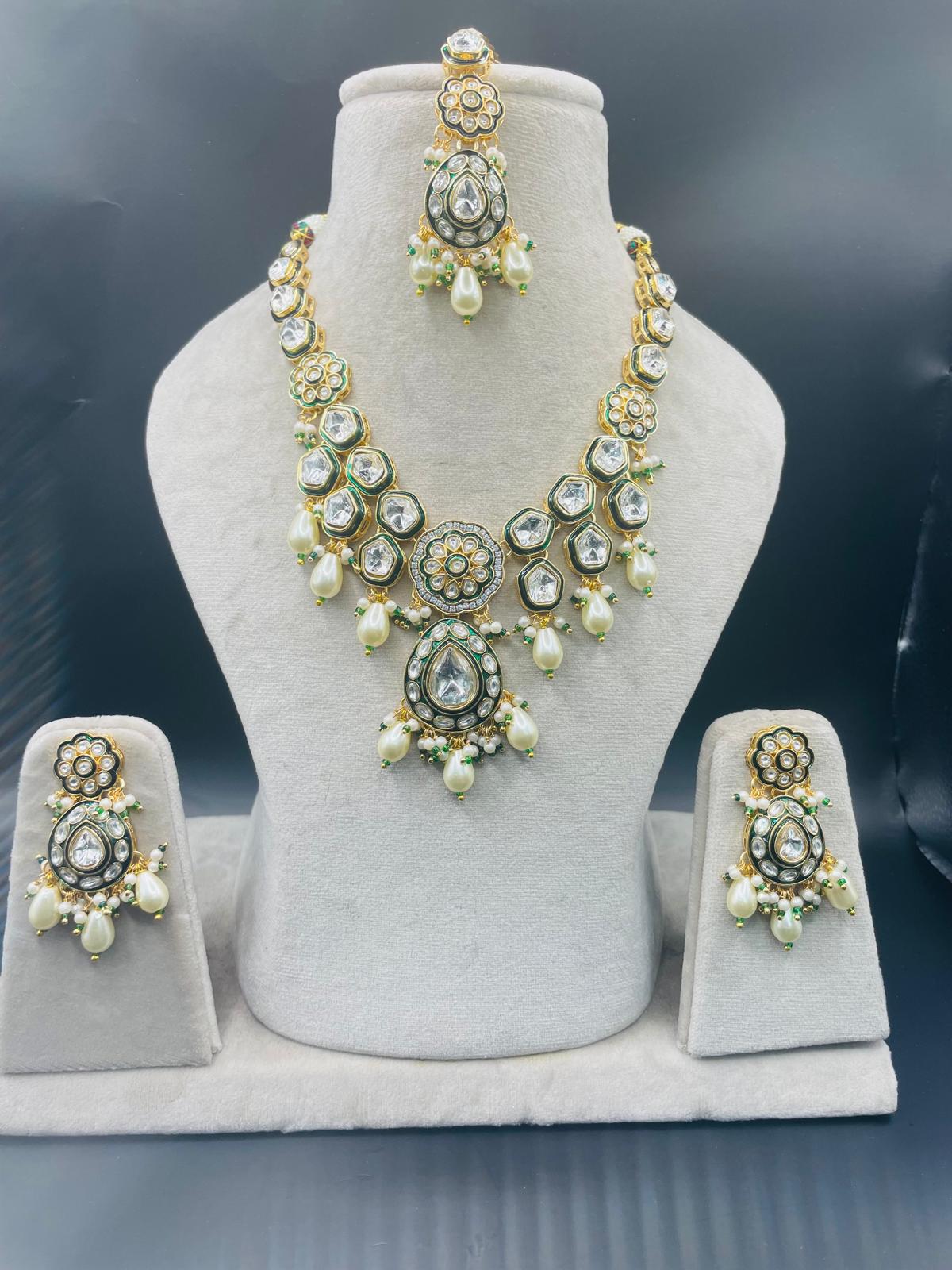 Beautiful designer kundan necklace sets with earrings and tikka in 2 colours