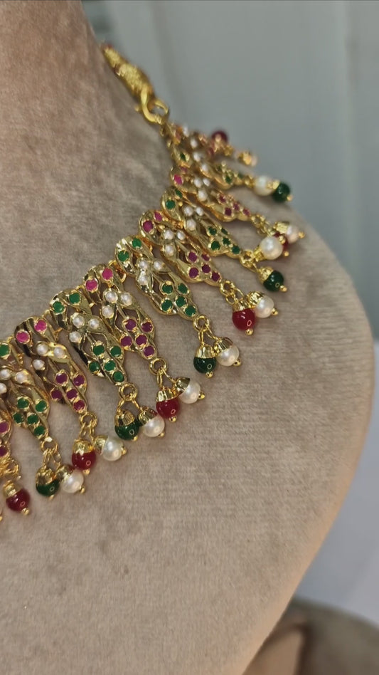 A heavy look, lightweight, Indian, gold plated and  jarau multicoloured set