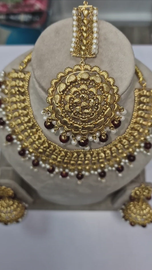 Indian gold plated ,light weight, Party Wear jewellery Set with matching Earrings and Tikka