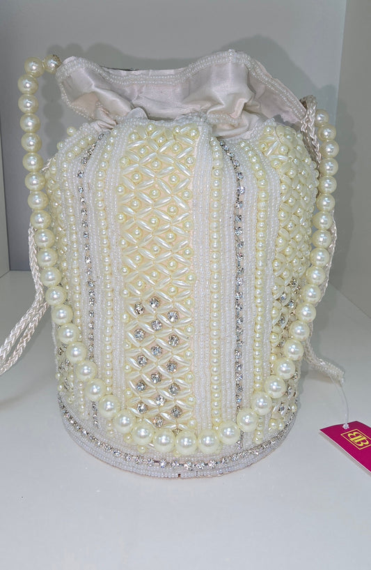Fancy cream potli